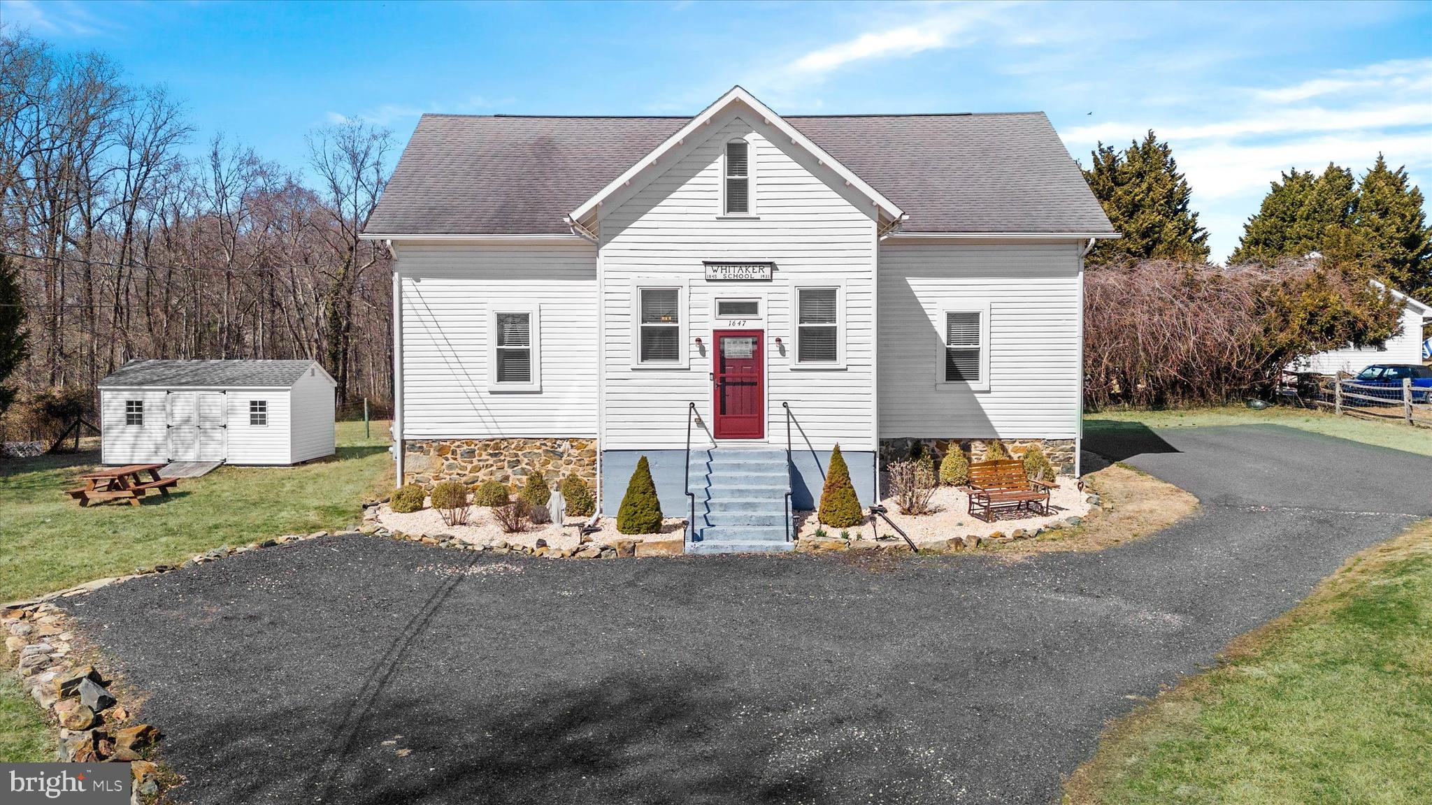 1647 Principio Furnace Road Perryville, MD 21903 - Photo 2 of 48 a front view of house with yard outdoor seating and garage