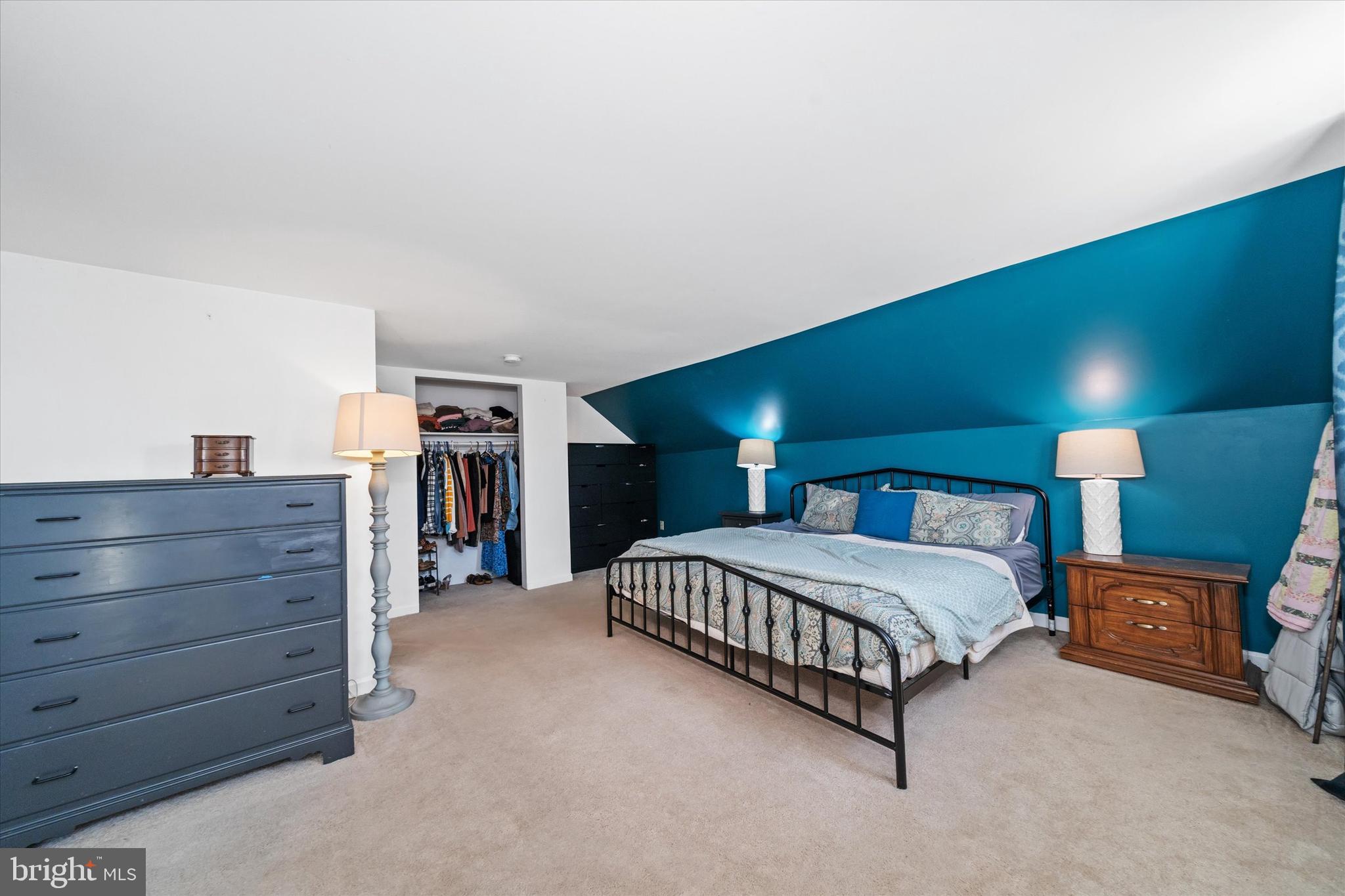 1647 Principio Furnace Road Perryville, MD 21903 - Photo 44 of 48 a spacious bedroom with a bed a lamp and a large window
