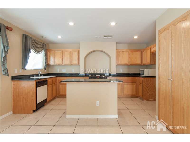 7298 Phlox Road Las Vegas, NV 89113 - Photo 3 of 14 Kitchen.