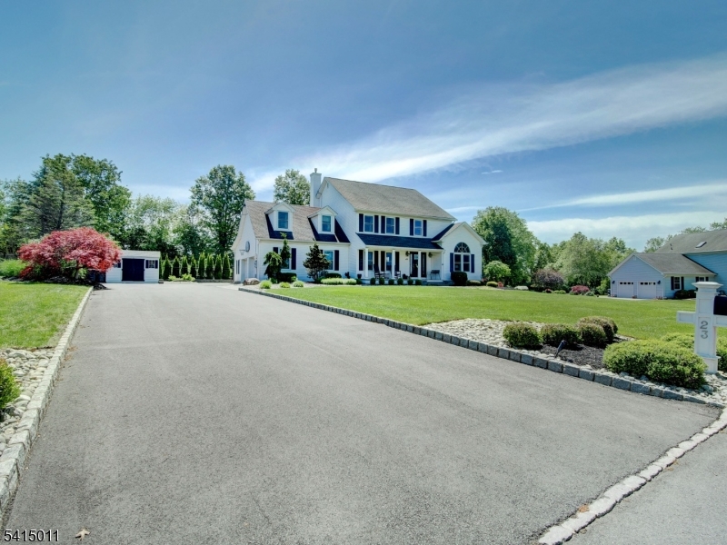 23 Ryerson Road Flemington, NJ 08822 - Photo 6 of 44 a view of a house with a yard and potted plants
