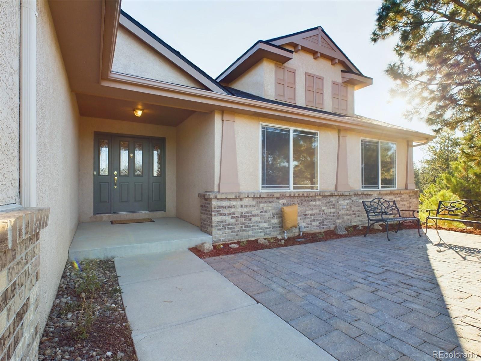 5140 Shoup Road Colorado Springs, CO 80908 - Photo 2 of 42 front view of a house