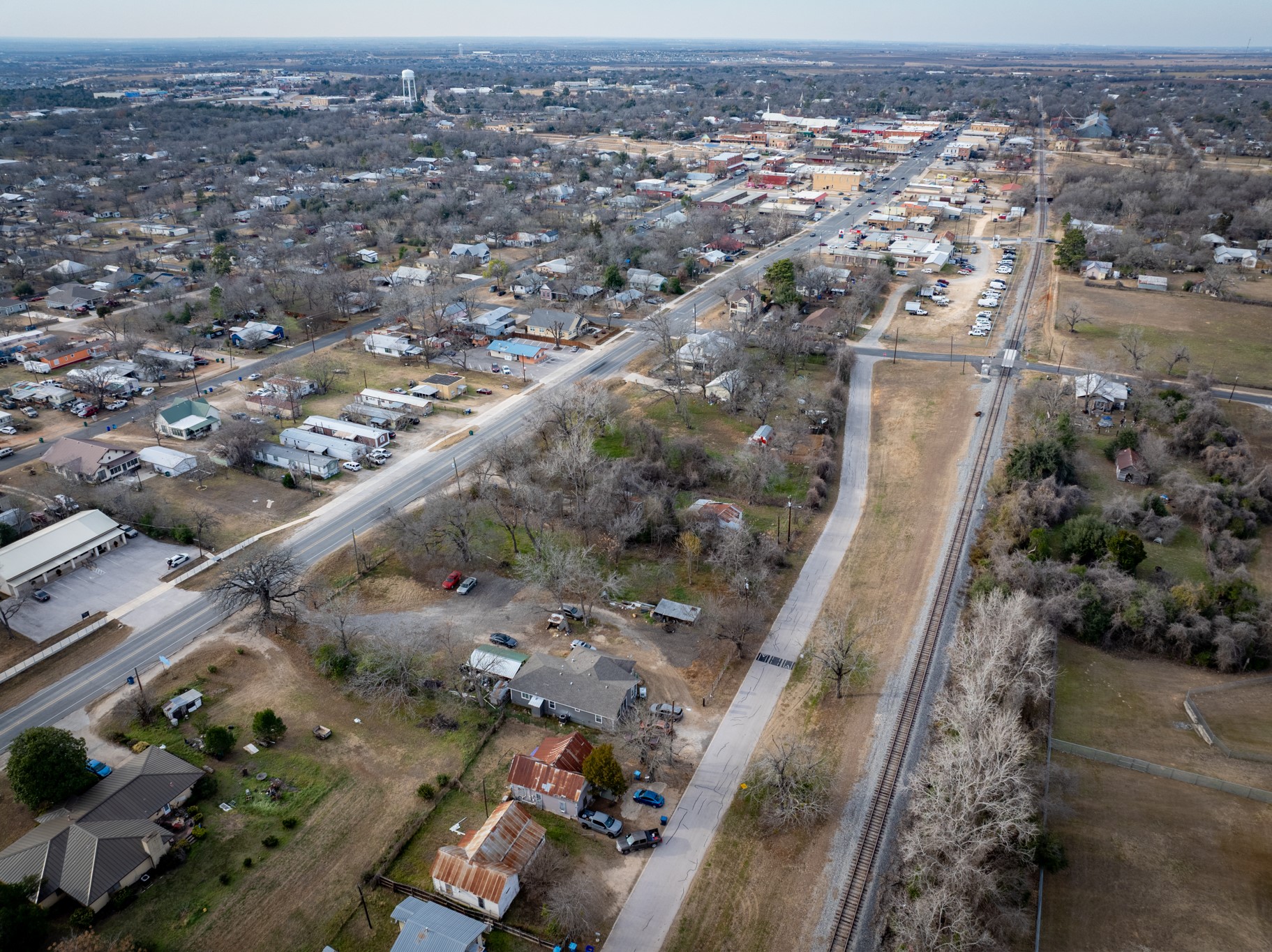 418 South Ave D Elgin, TX 78621 - Photo 21 of 29 an aerial view of a city with lots of residential buildings
