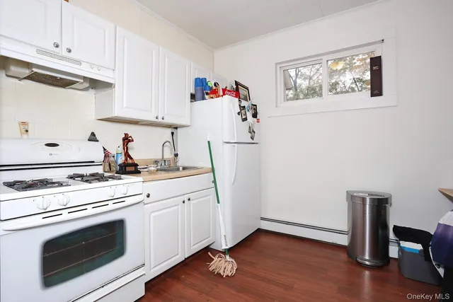 a bedroom with furniture and a book shelf