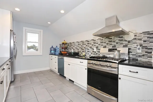 a view of kitchen with windows