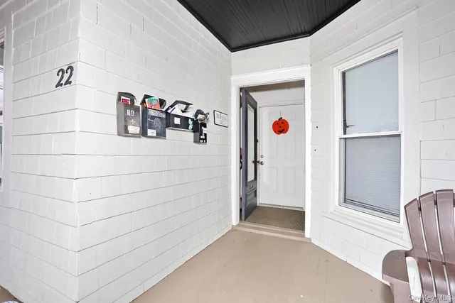 a house with a parked car