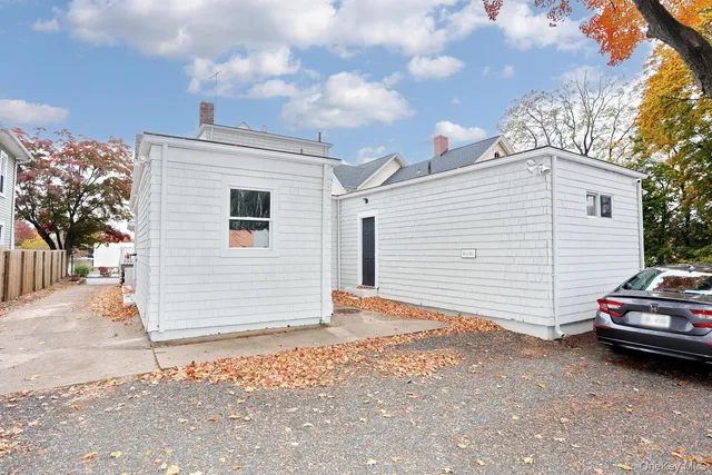 a car parked in front of a house