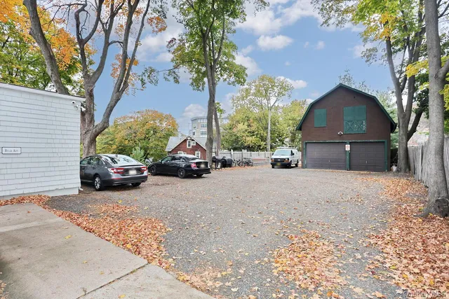 a front view of a house with yard