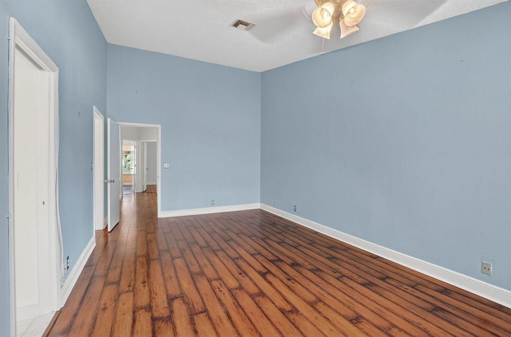 5051 Pointe Emerald Lane, Unit 5051 Boca Raton, FL 33431 - Photo 24 of 65 a view of wooden floor in an empty room