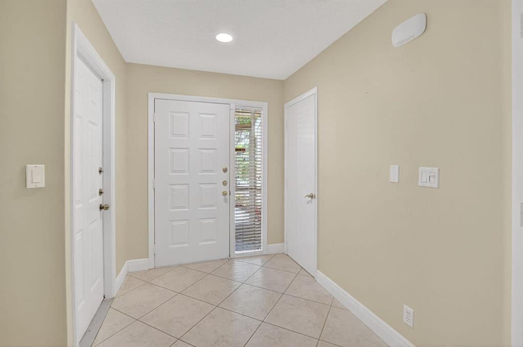 5051 Pointe Emerald Lane, Unit 5051 Boca Raton, FL 33431 - Photo 27 of 65 an empty room with closet