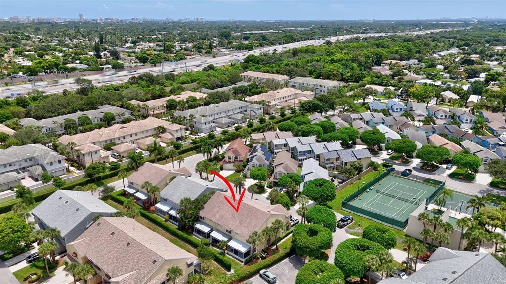 5051 Pointe Emerald Lane, Unit 5051 Boca Raton, FL 33431 - Photo 41 of 65 an aerial view of residential houses with outdoor space