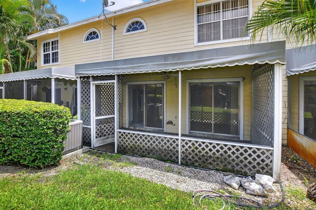 5051 Pointe Emerald Lane, Unit 5051 Boca Raton, FL 33431 - Photo 60 of 65 front view of a house
