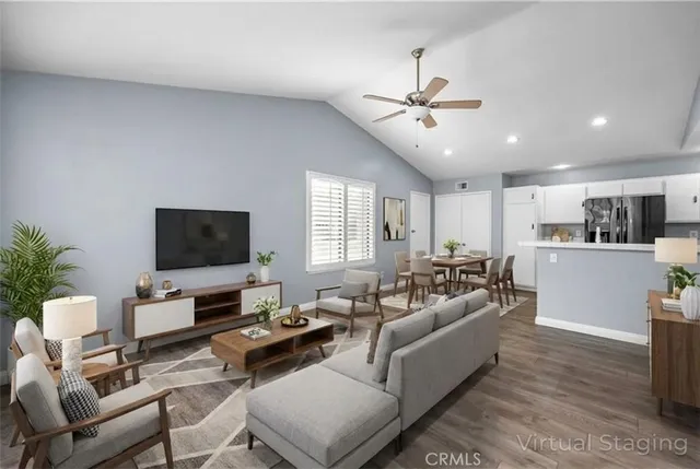 a kitchen with stainless steel appliances a refrigerator sink and cabinets