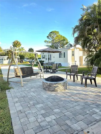 a view of a swimming pool with a patio