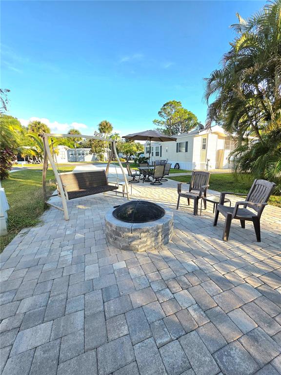 26 West Appaloosa Trail River Ranch, FL 33867 - Photo 8 of 9 a view of a terrace with seating space