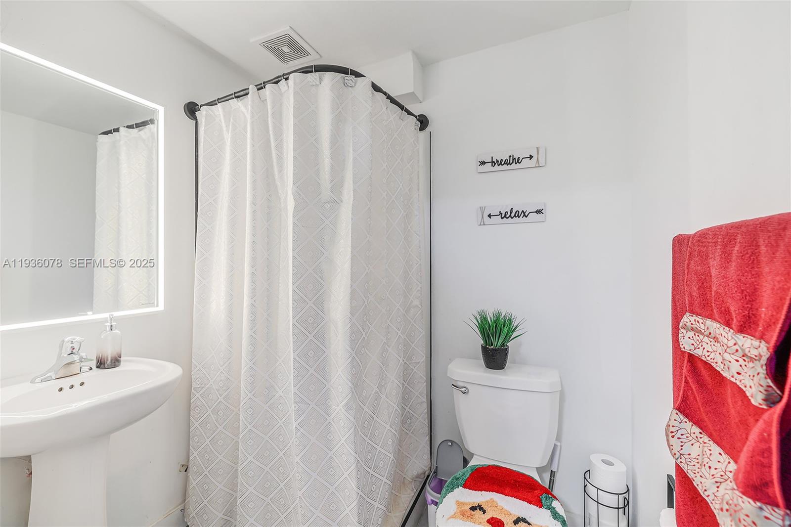 11907 Southwest 247th Terrace Homestead, FL 33032 - Photo 12 of 35 a bathroom with a sink toilet and shower