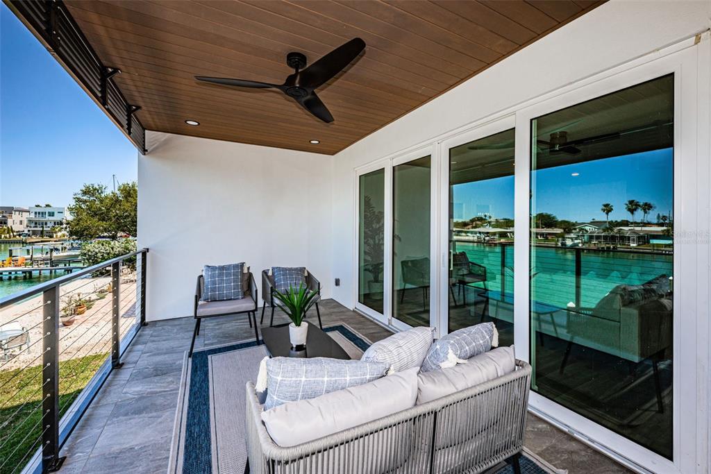12305 3rd Street East, Unit 2 Treasure Island, FL 33706 - Photo 17 of 69 a outdoor living space with furniture