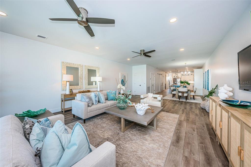 12305 3rd Street East, Unit 2 Treasure Island, FL 33706 - Photo 23 of 69 a living room with furniture and a view of kitchen
