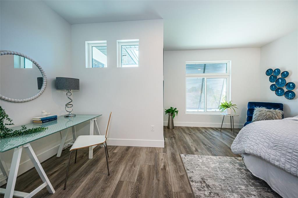 12305 3rd Street East, Unit 2 Treasure Island, FL 33706 - Photo 47 of 69 a living room with furniture and a wooden floor