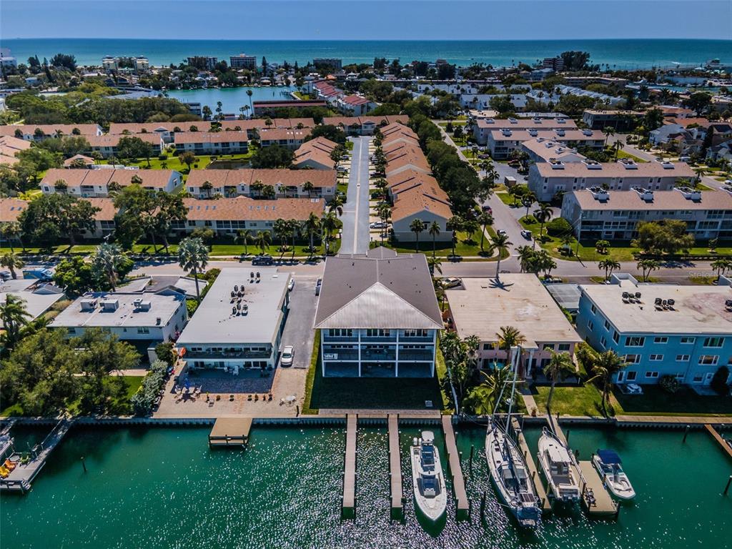 12305 3rd Street East, Unit 2 Treasure Island, FL 33706 - Photo 58 of 69 an aerial view of a house with garden space and street view