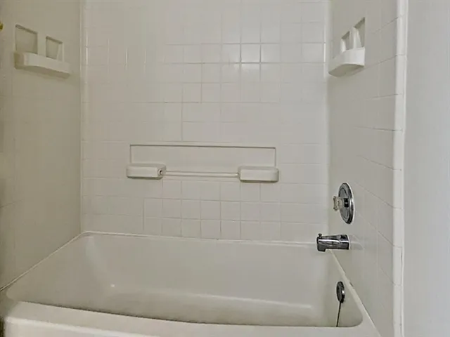 a bathroom with a bathtub