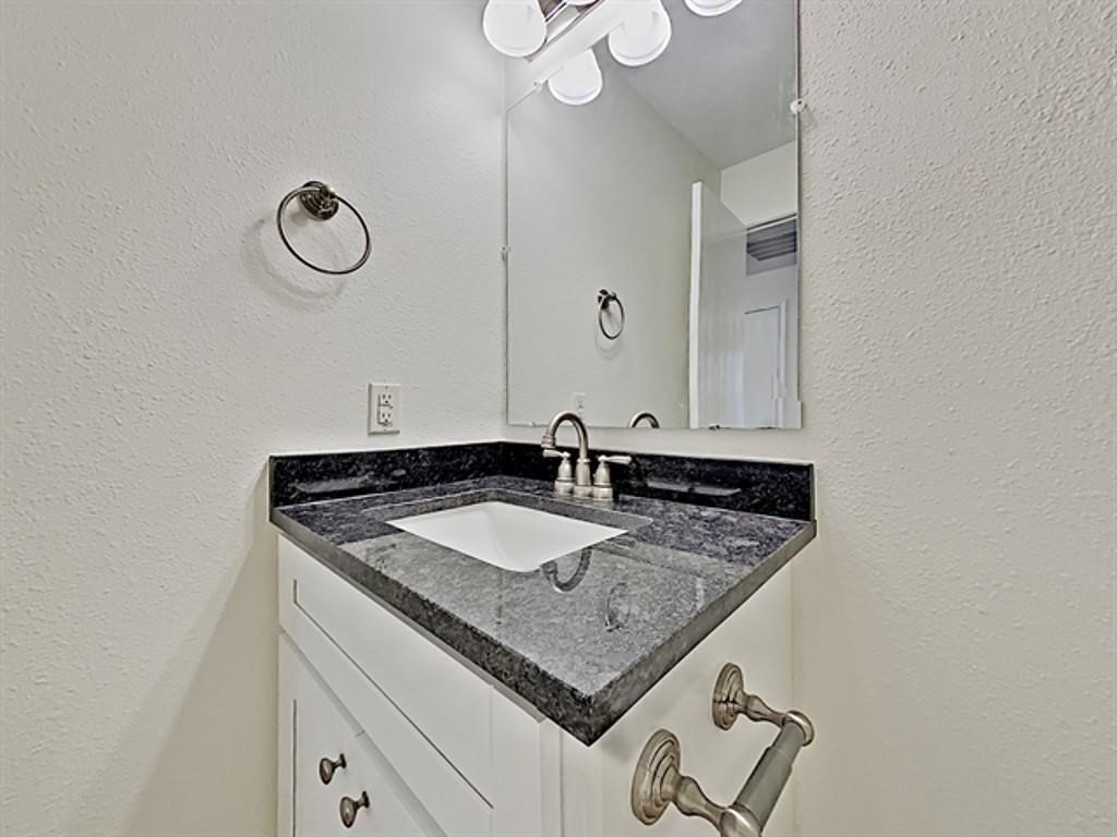 6830 Shallow River Court Spring, TX 77379 - Photo 13 of 17 a bathroom with a sink and a mirror