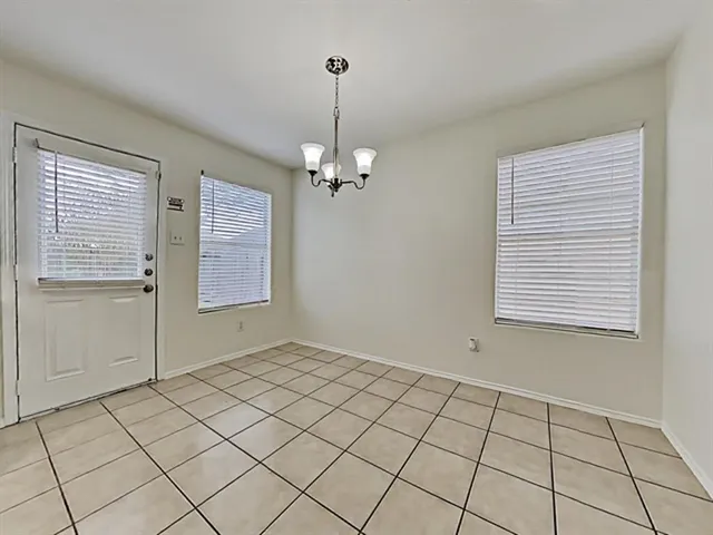 a view of an empty room with window