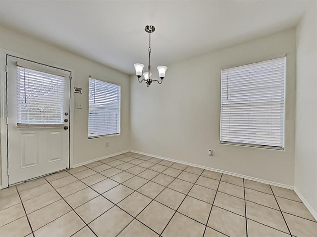 6830 Shallow River Court Spring, TX 77379 - Photo 5 of 17 a view of an empty room with window