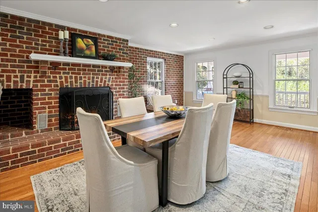 a workspace with furniture window and wooden floor