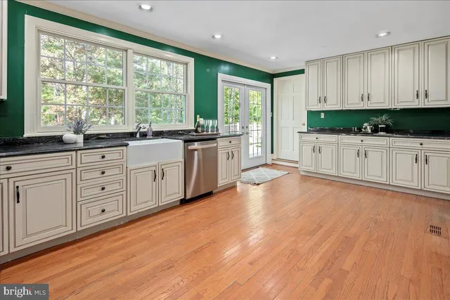 a bed room with a bed and a flat screen tv