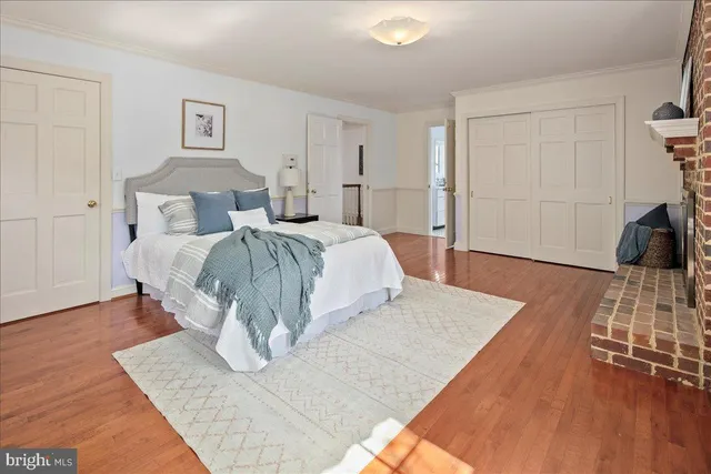 a view of a house with a wooden deck