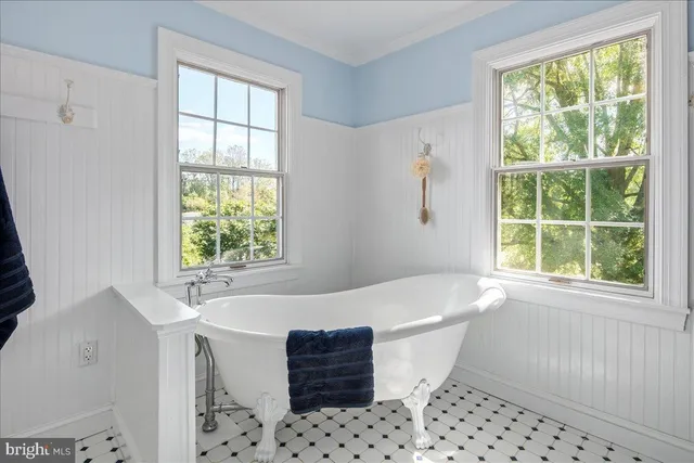 a front view of a house with a garage