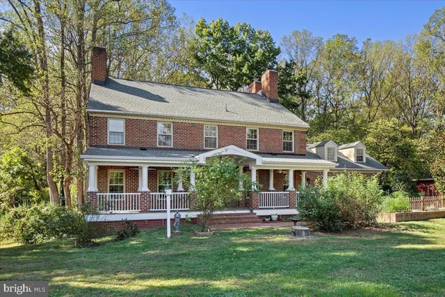a view of a porch with wooden floor and outdoor space