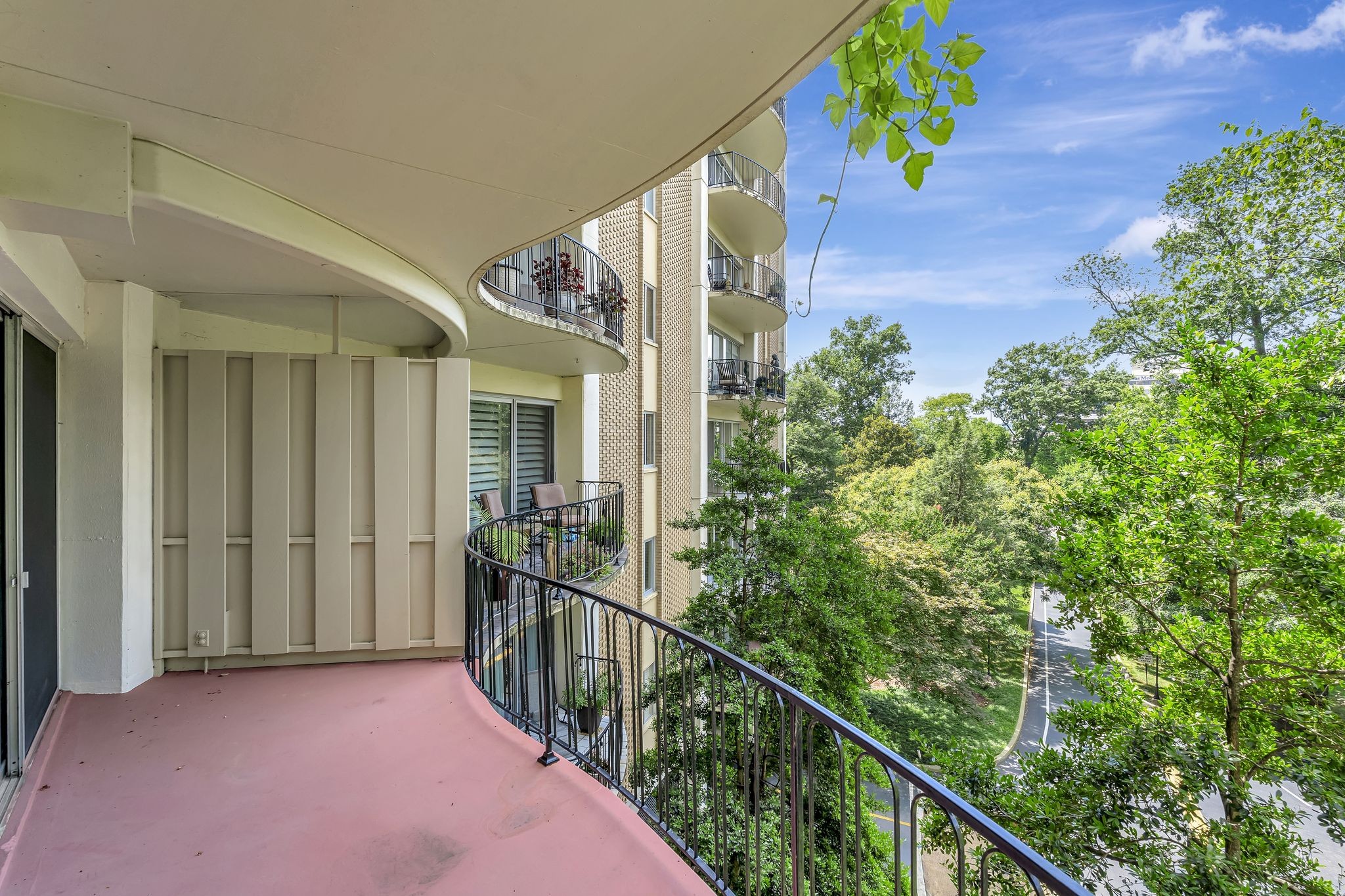 4215 Harding Pike, Unit 403 Nashville, TN 37205 - Photo 17 of 25 a view of a house with balcony