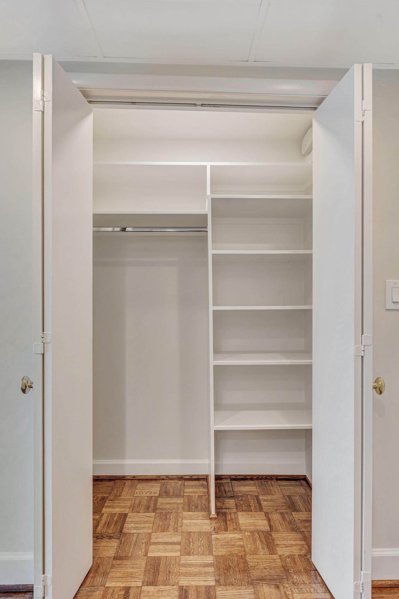4215 Harding Pike, Unit 403 Nashville, TN 37205 - Photo 4 of 25 a view of walk in closet with empty racks