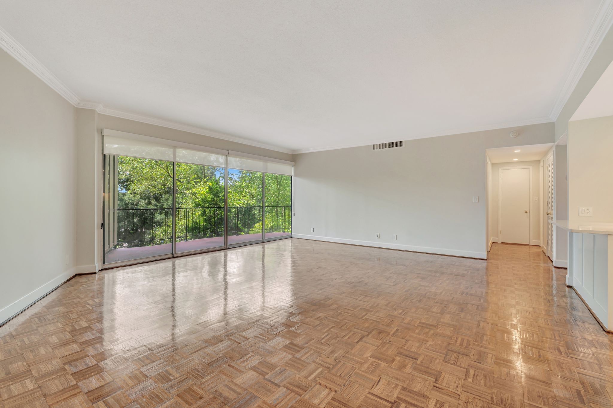 4215 Harding Pike, Unit 403 Nashville, TN 37205 - Photo 5 of 25 wooden floor in an empty room with a window