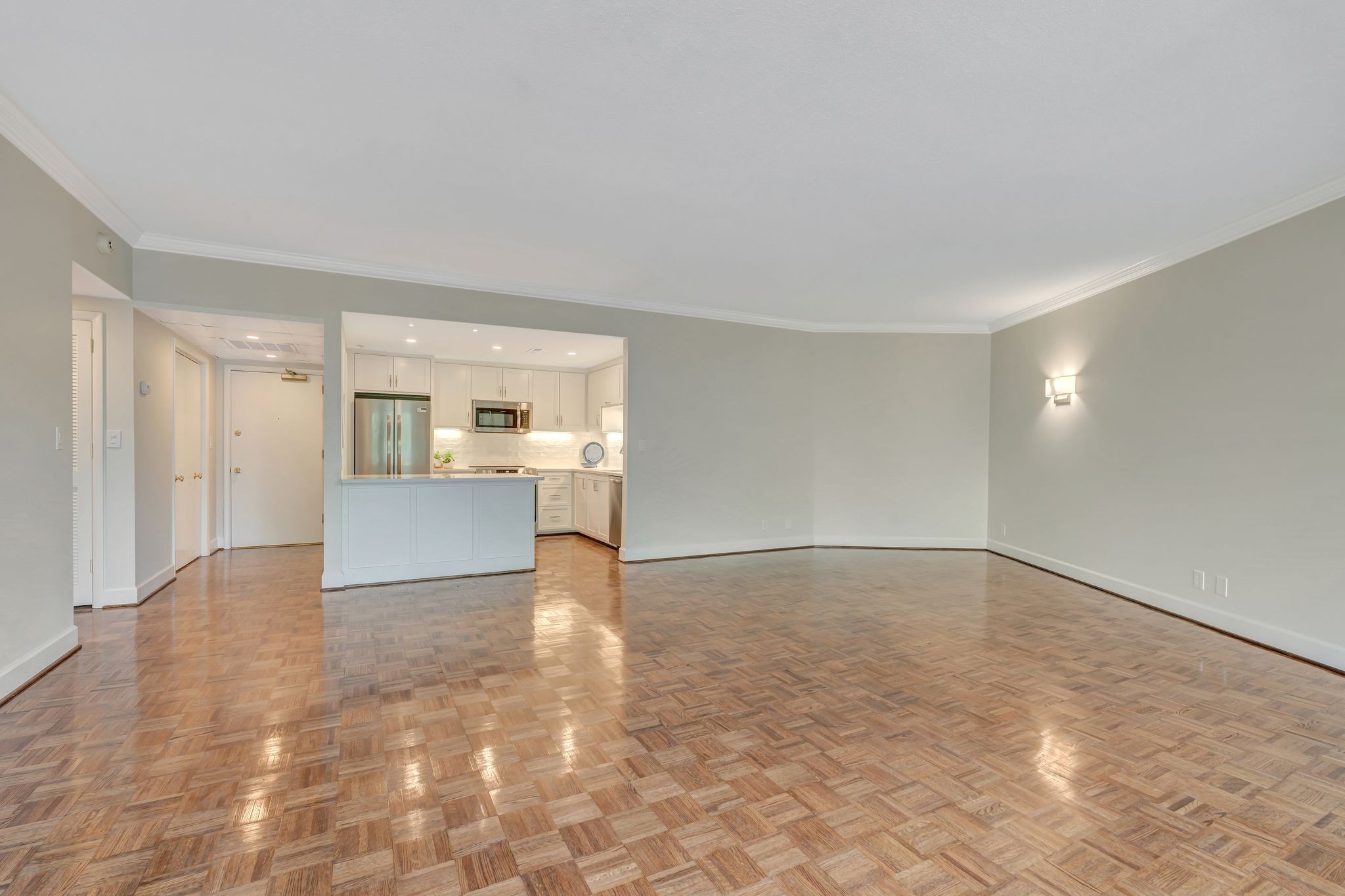 4215 Harding Pike, Unit 403 Nashville, TN 37205 - Photo 7 of 25 a view of a kitchen with a sink and a refrigerator