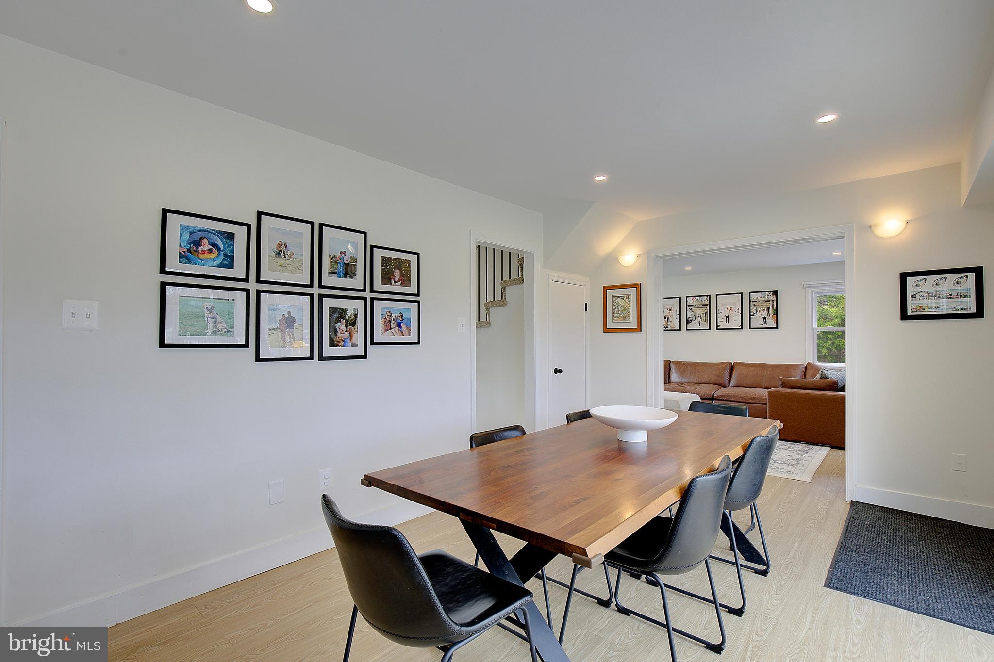 1702 Saxony Place Crofton, MD 21114 - Photo 22 of 65 a view of a dining room with furniture