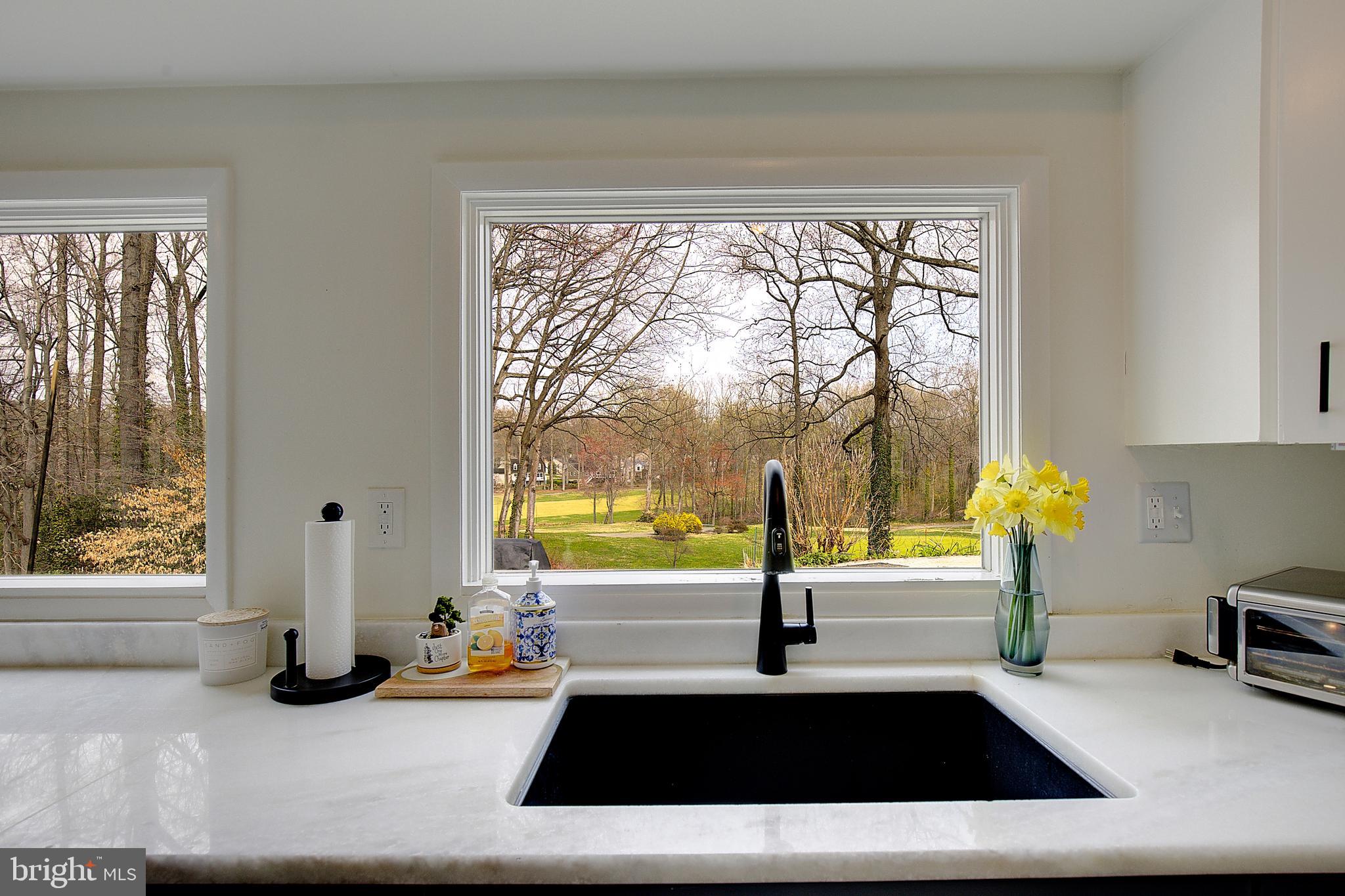 1702 Saxony Place Crofton, MD 21114 - Photo 27 of 65 a kitchen with counter top space and a large window