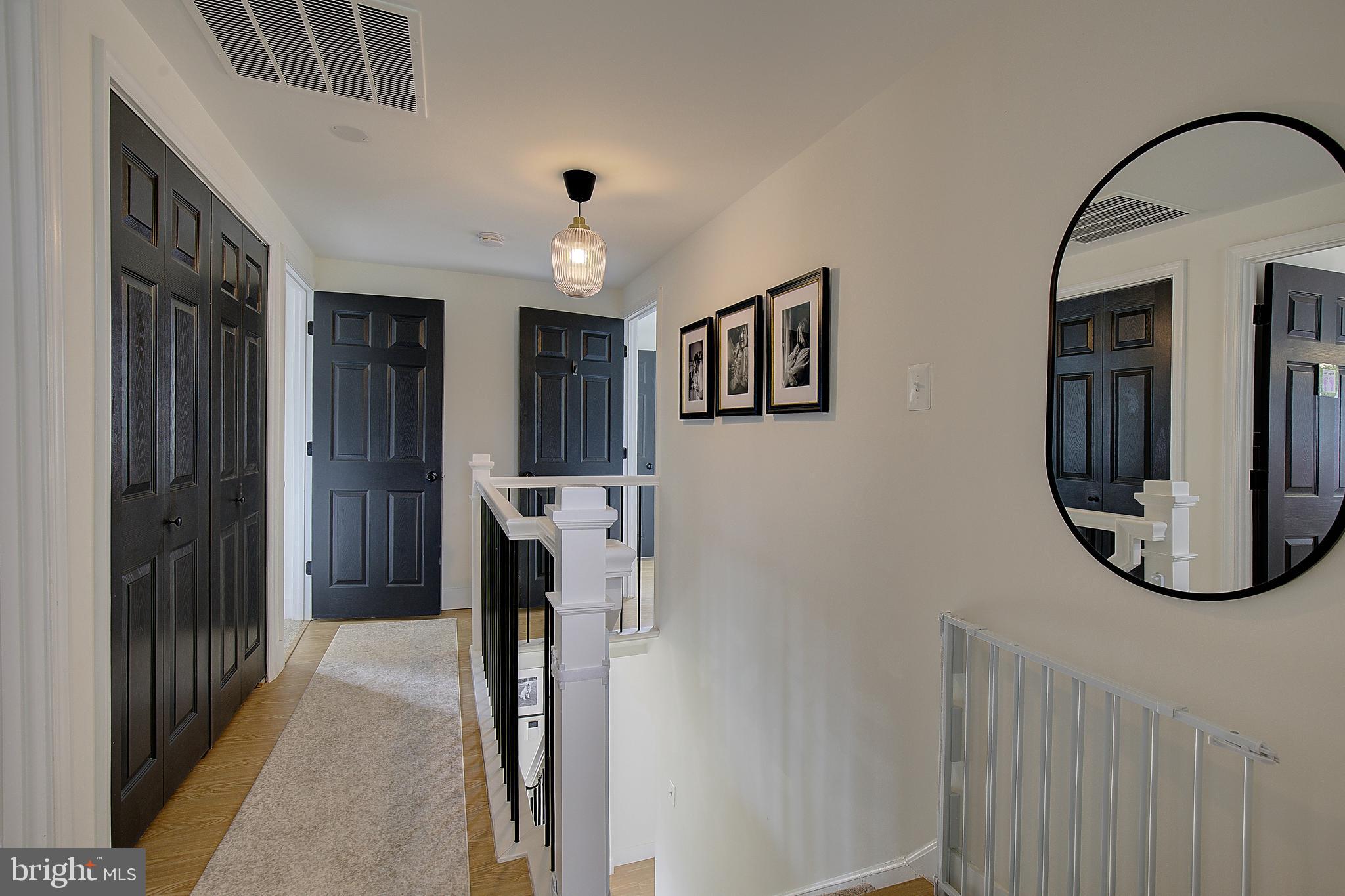 1702 Saxony Place Crofton, MD 21114 - Photo 32 of 65 a view of a hallway with front door