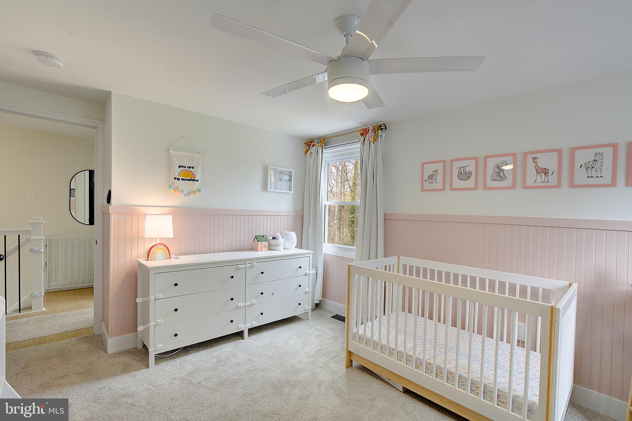 1702 Saxony Place Crofton, MD 21114 - Photo 35 of 65 a bedroom with a bed and a window