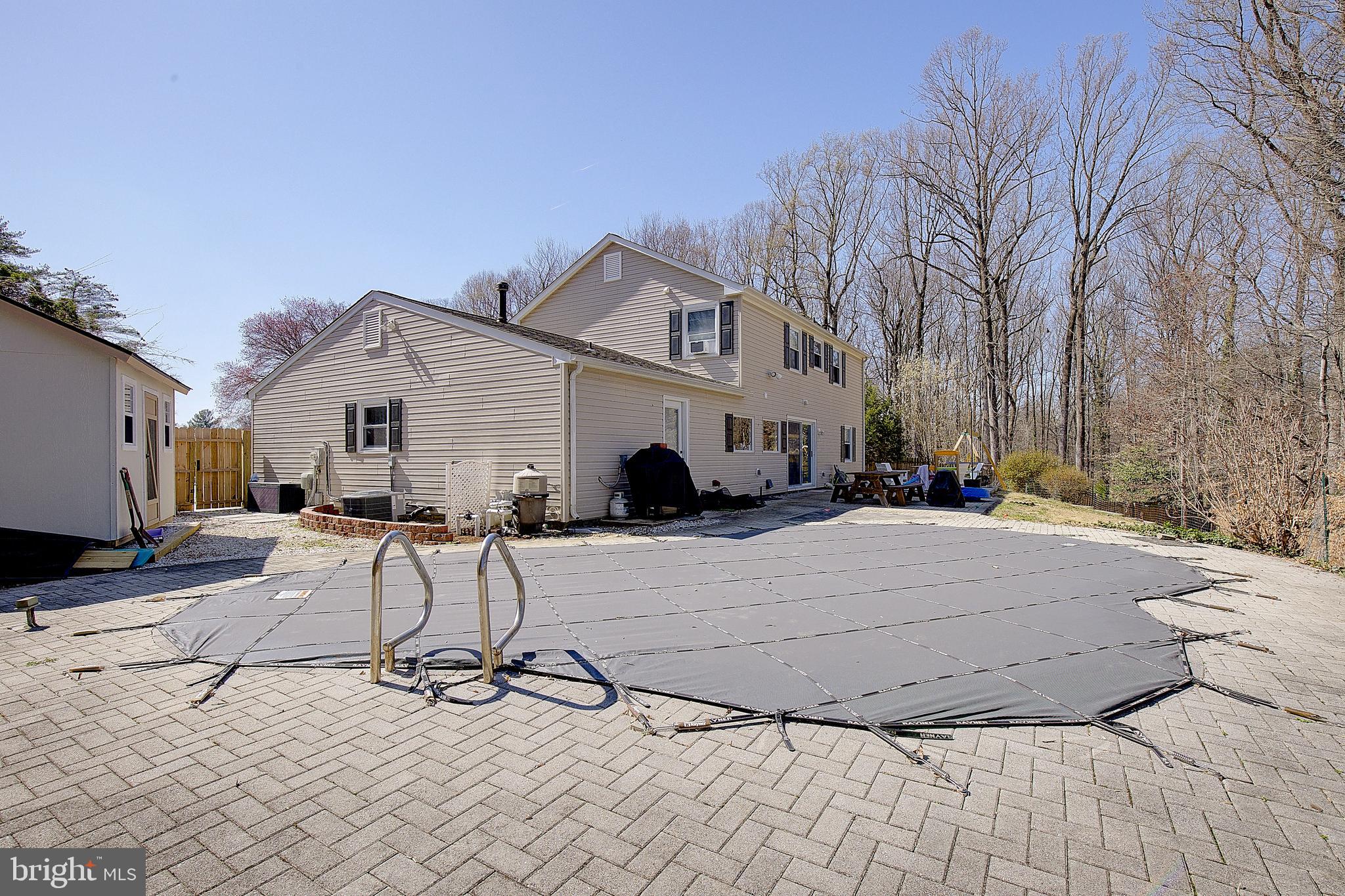 1702 Saxony Place Crofton, MD 21114 - Photo 43 of 65 a view of a house with a patio