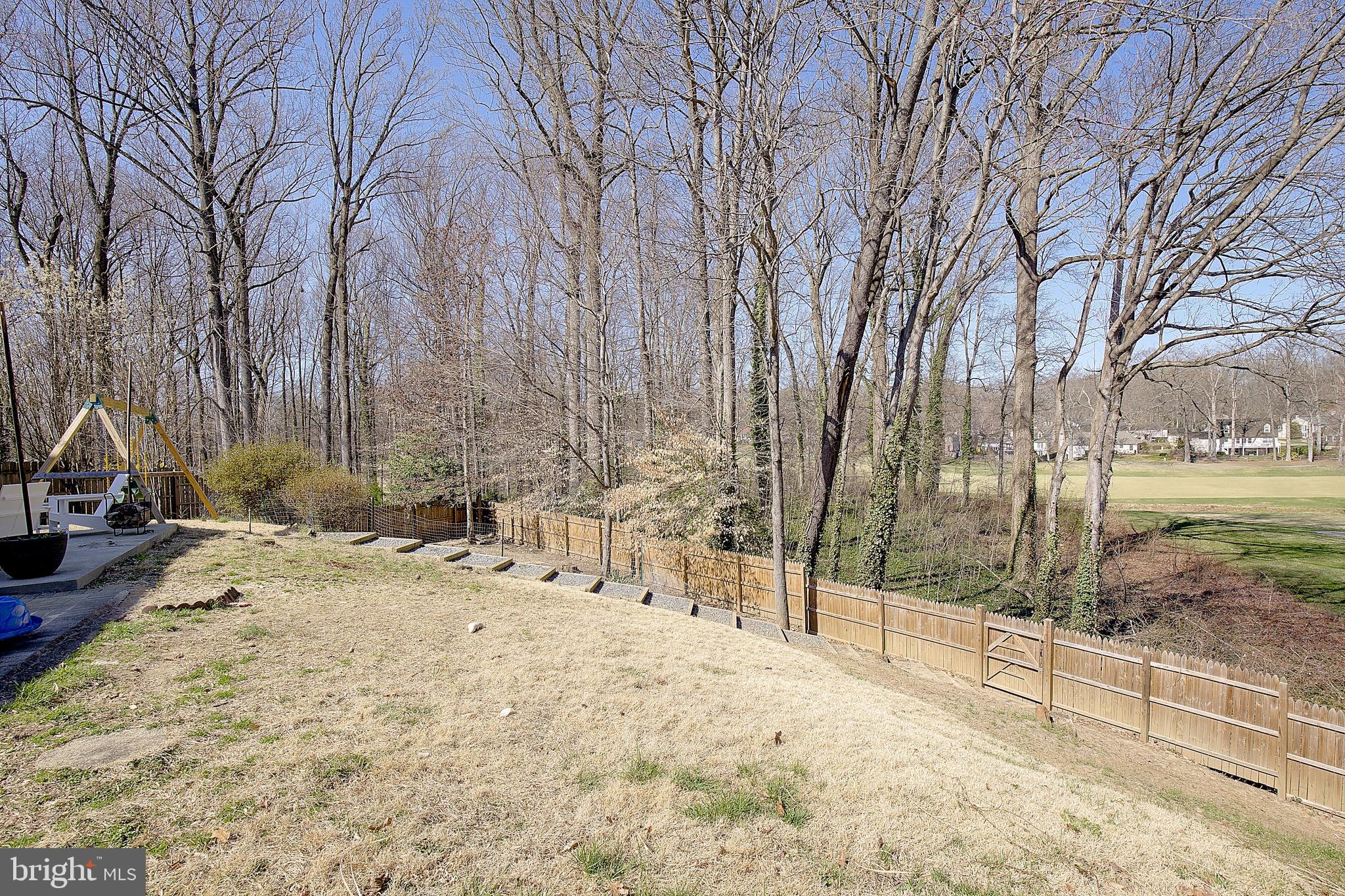 1702 Saxony Place Crofton, MD 21114 - Photo 50 of 65 a view of a yard covered in snow