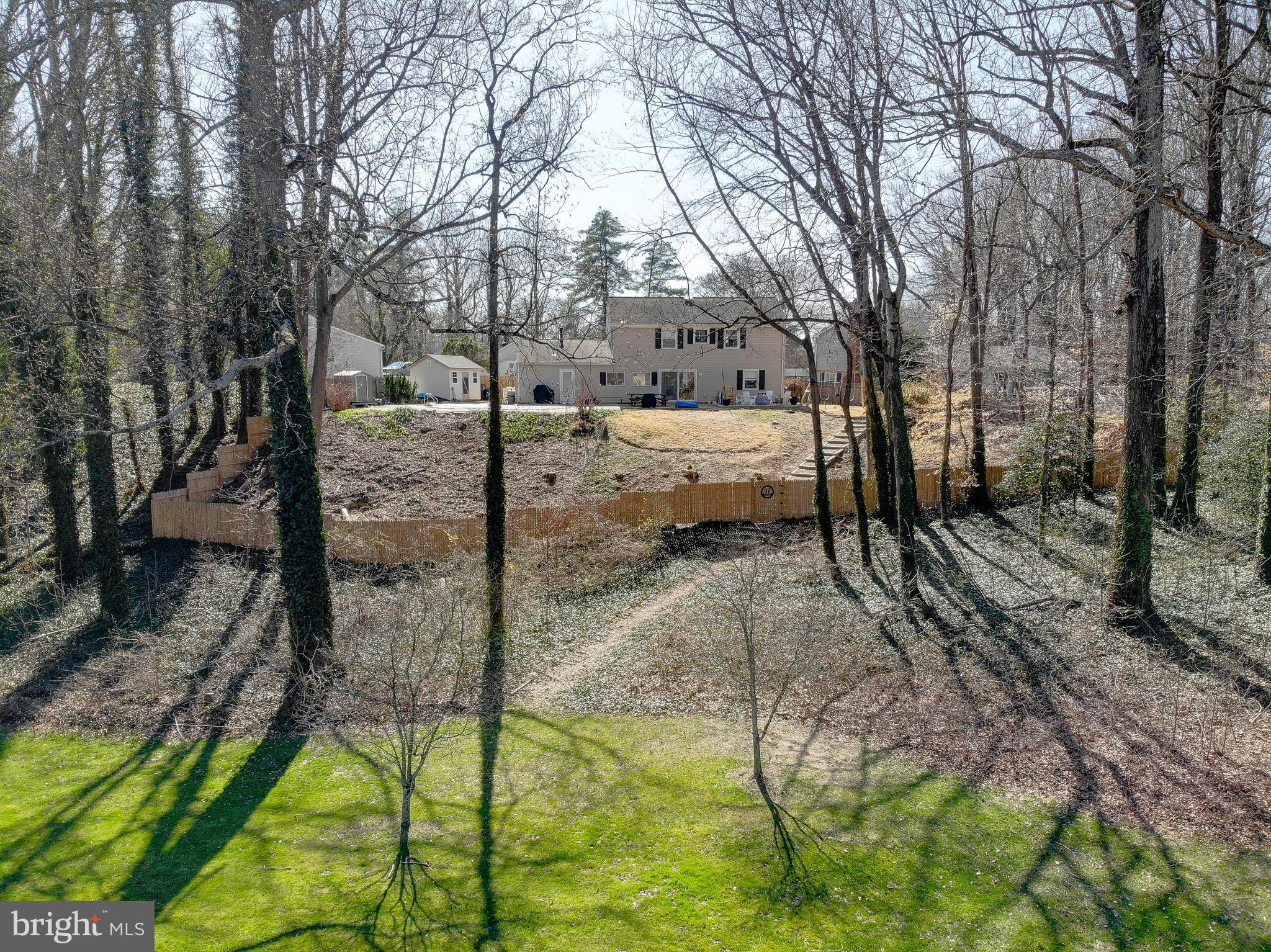 1702 Saxony Place Crofton, MD 21114 - Photo 54 of 65 a view of a yard with wooden fence