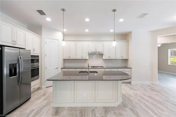 $850,000 | 21539 Oaks Of Estero Circle, Estero, FL 33928