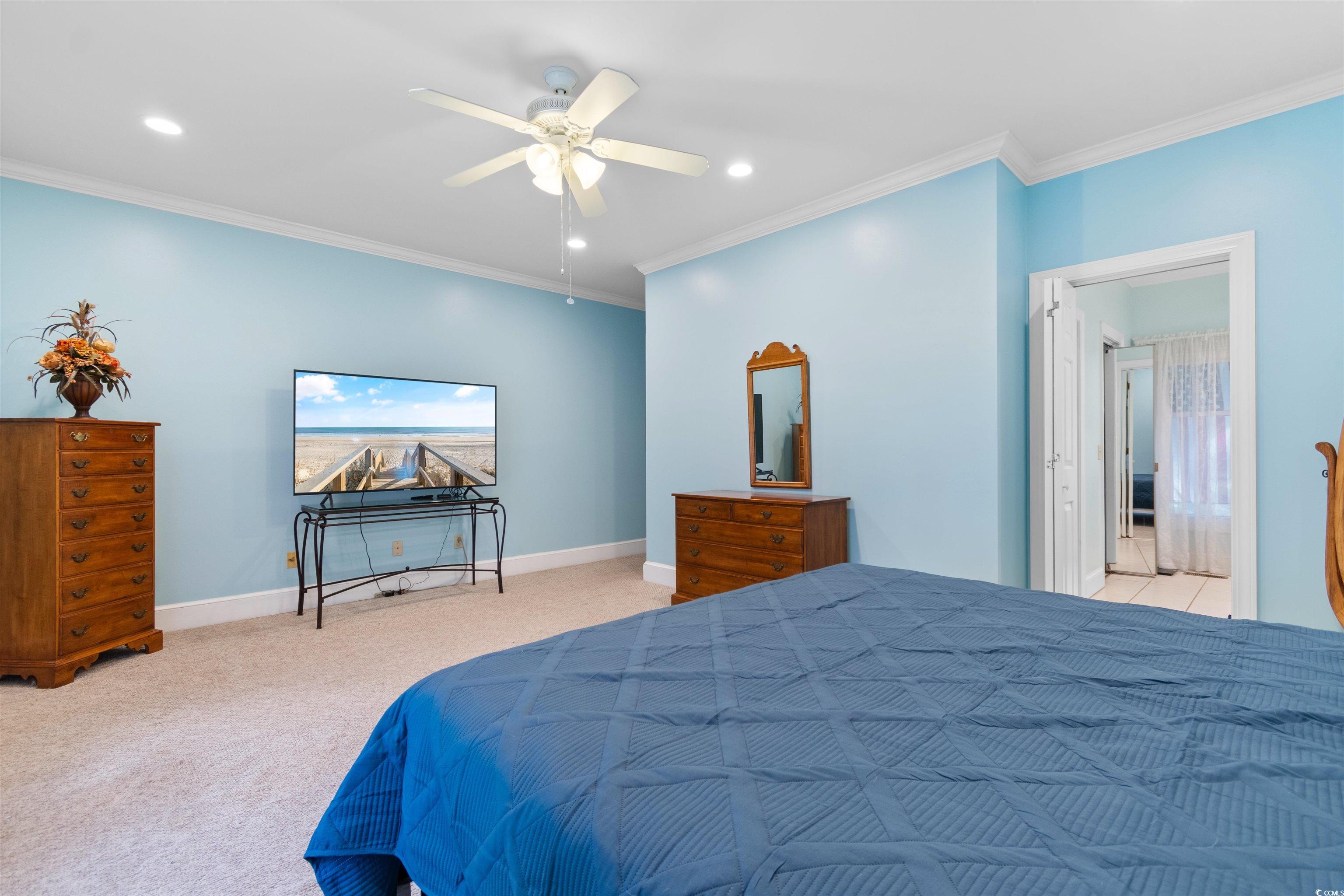 14 Live Oak Lane Georgetown, SC 29440 - Photo 19 of 40 Bedroom with ornamental molding, light colored carpet, recessed lighting, and a ceiling fan