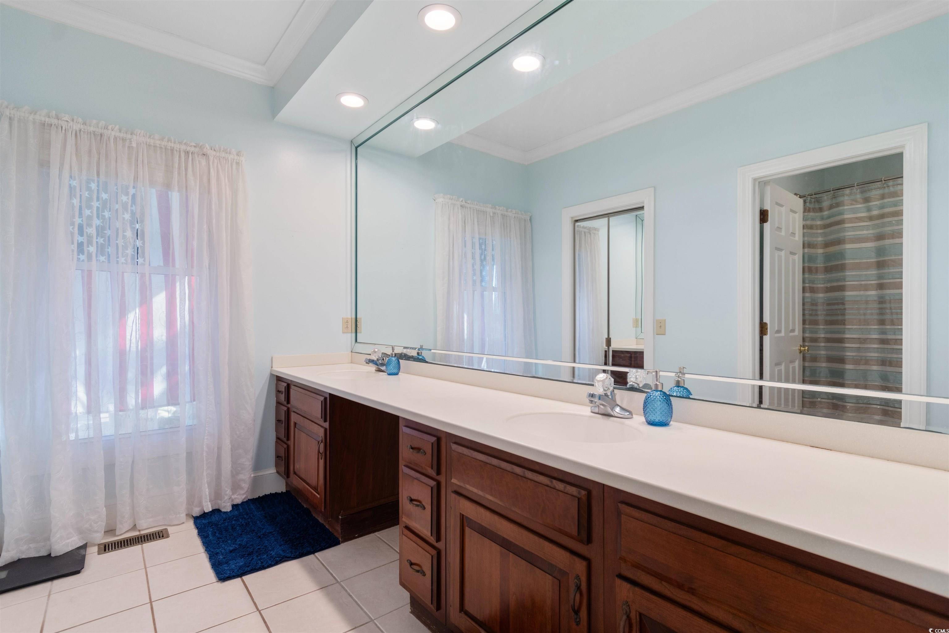 14 Live Oak Lane Georgetown, SC 29440 - Photo 20 of 40 Bathroom with ornamental molding, double vanity, light tile patterned floors, and recessed lighting