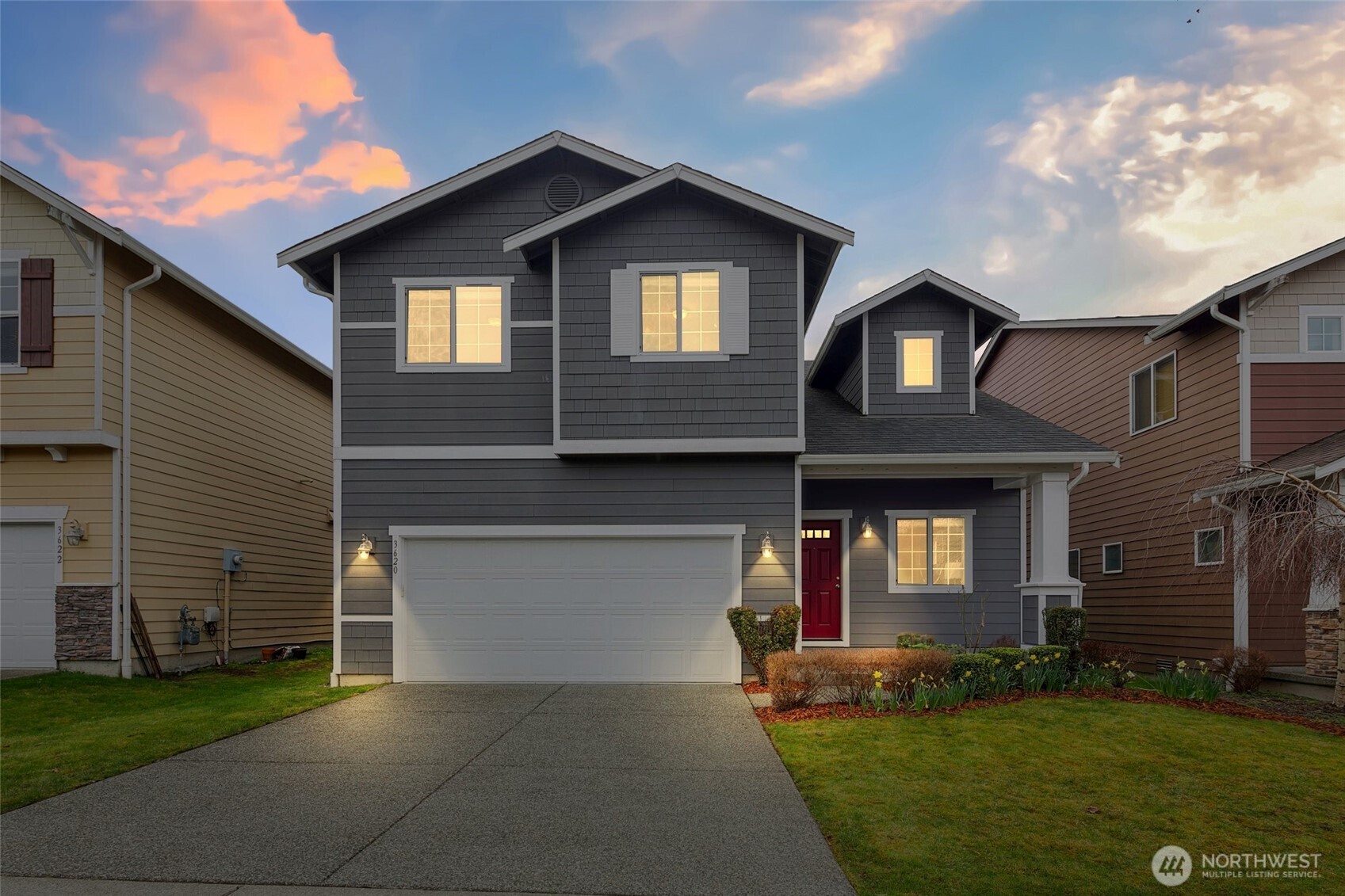 3620 224th Street Southeast Bothell, WA 98021 - Photo 1 of 1 a front view of a house with a yard and garage