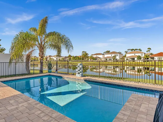 a aerial view of a house with a yard
