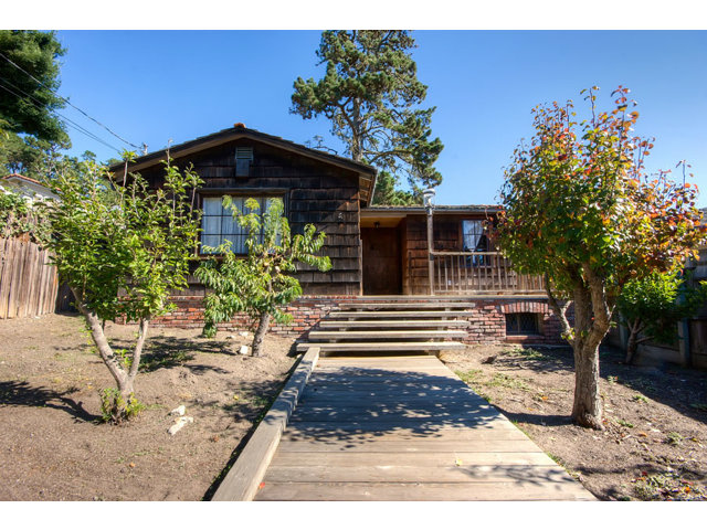 0 Carpenter Street Carmel, CA 93923 - Photo 1 of 20 a front view of a house with garden