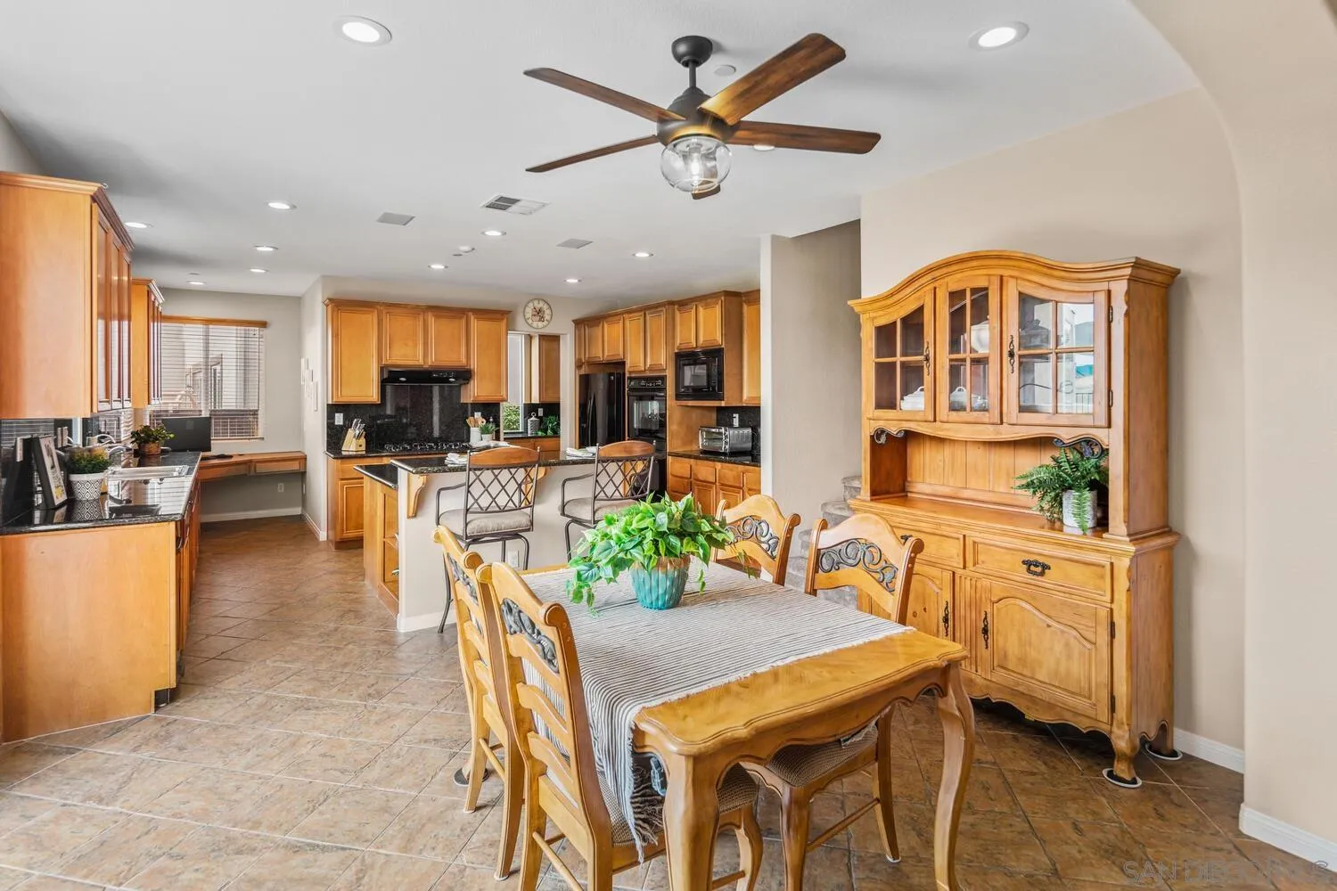 16327 Pinto Ridge Drive 4S Ranch, CA 92127 - Photo 24 of 74 a view of a dining room with furniture window and wooden floor